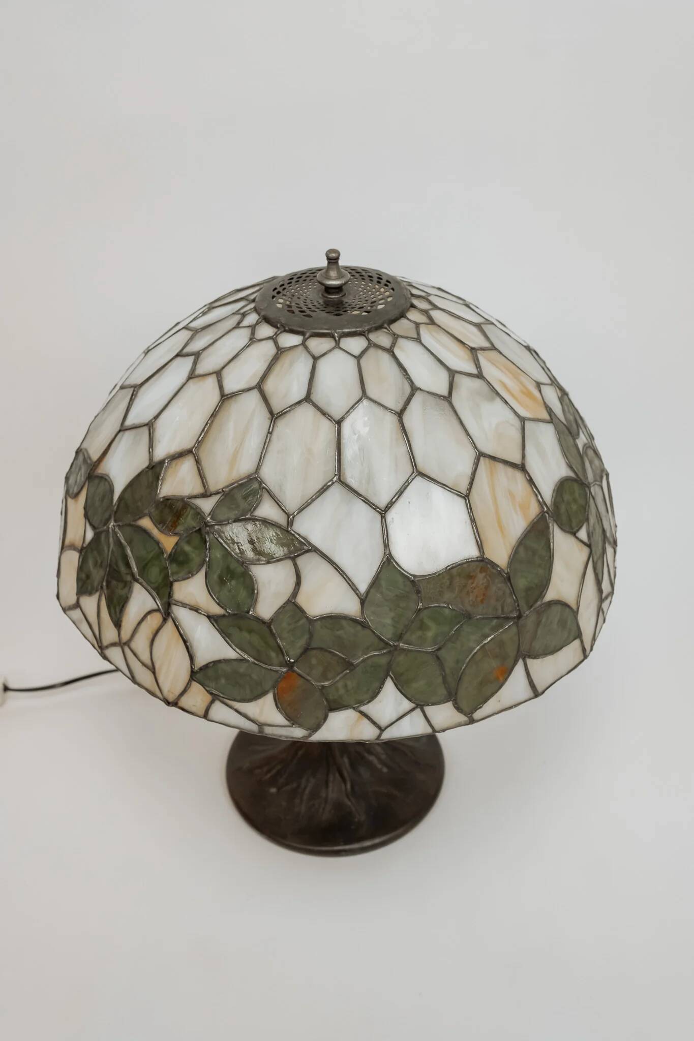 Tiffany-style table lamp with stained glass shade