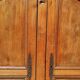Old rustic oak cabinet of the 19th century louis 15 style