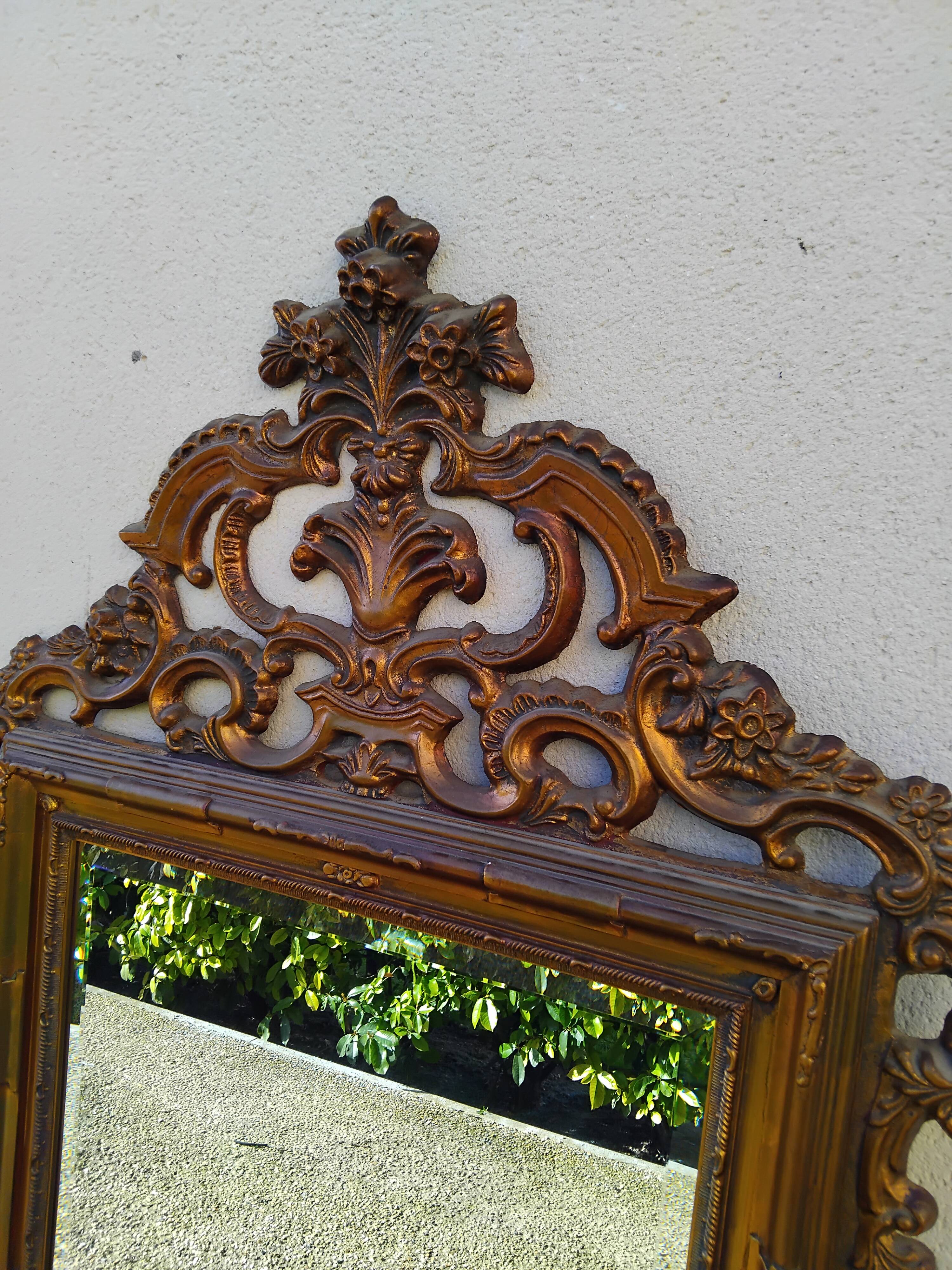 Old large Louis XV style mirror, stucco, wood, resin, beveled