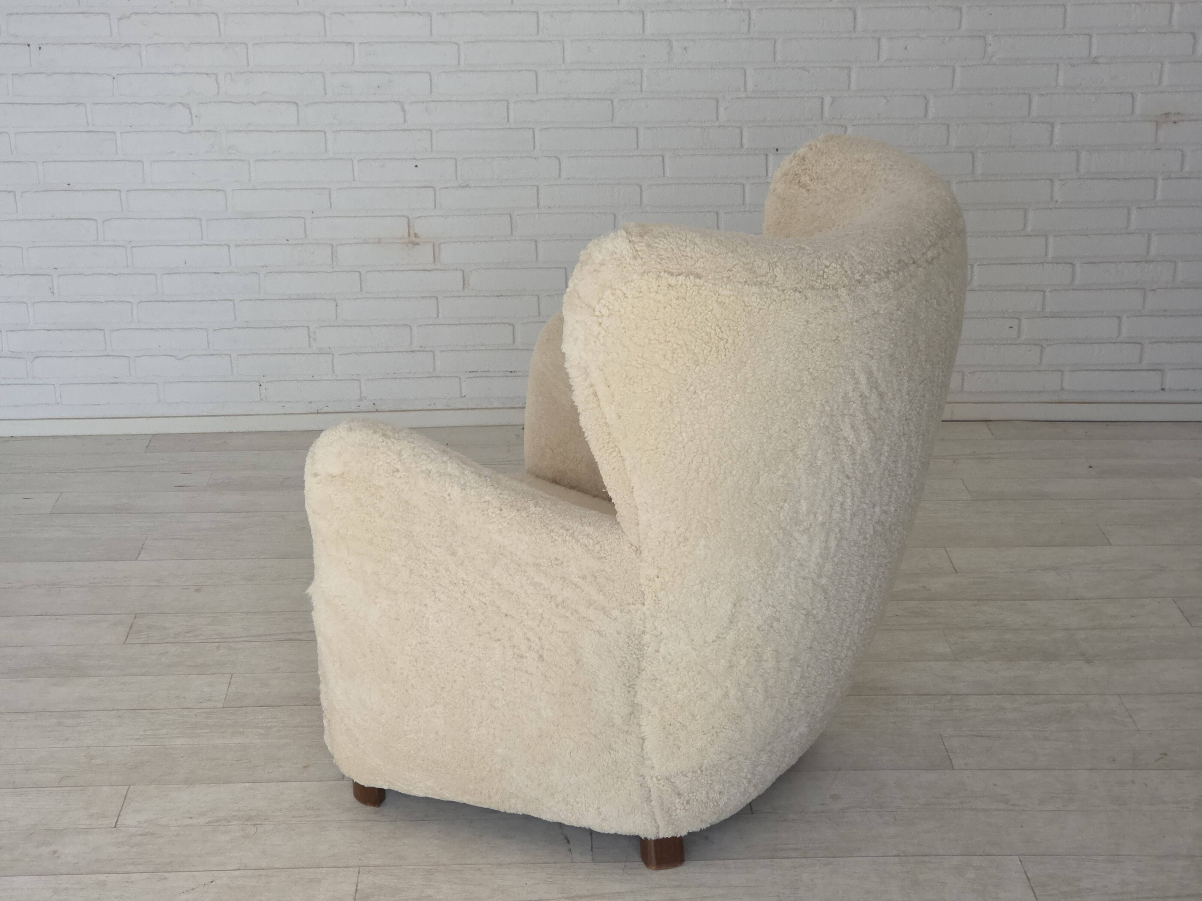 1960s, Danish armchair, genuine sheepskin "Canberra", reupholstered.