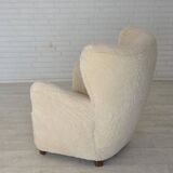 1960s, Danish armchair, genuine sheepskin "Canberra", reupholstered.
