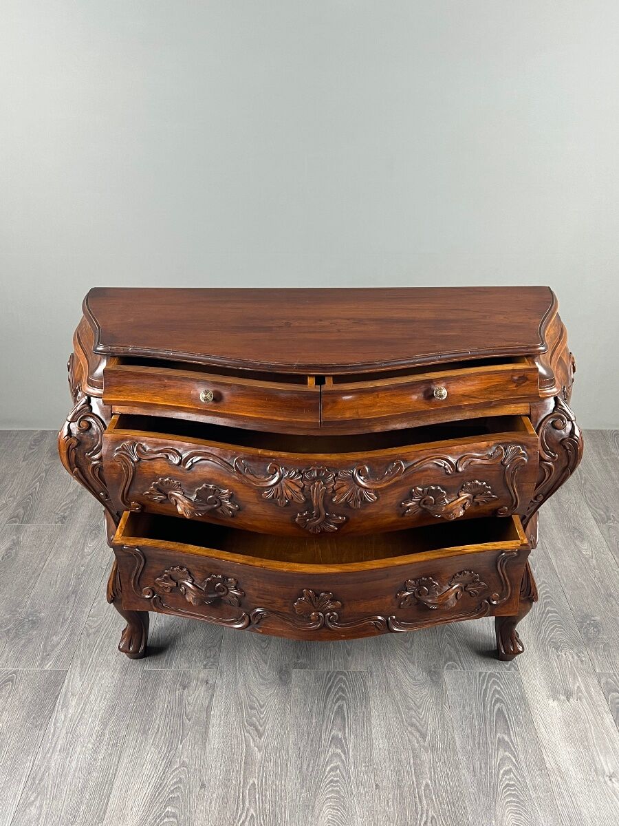 Curved commode in the Louis XV style, carved wood, 19th century.