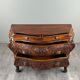 Curved commode in the Louis XV style, carved wood, 19th century.
