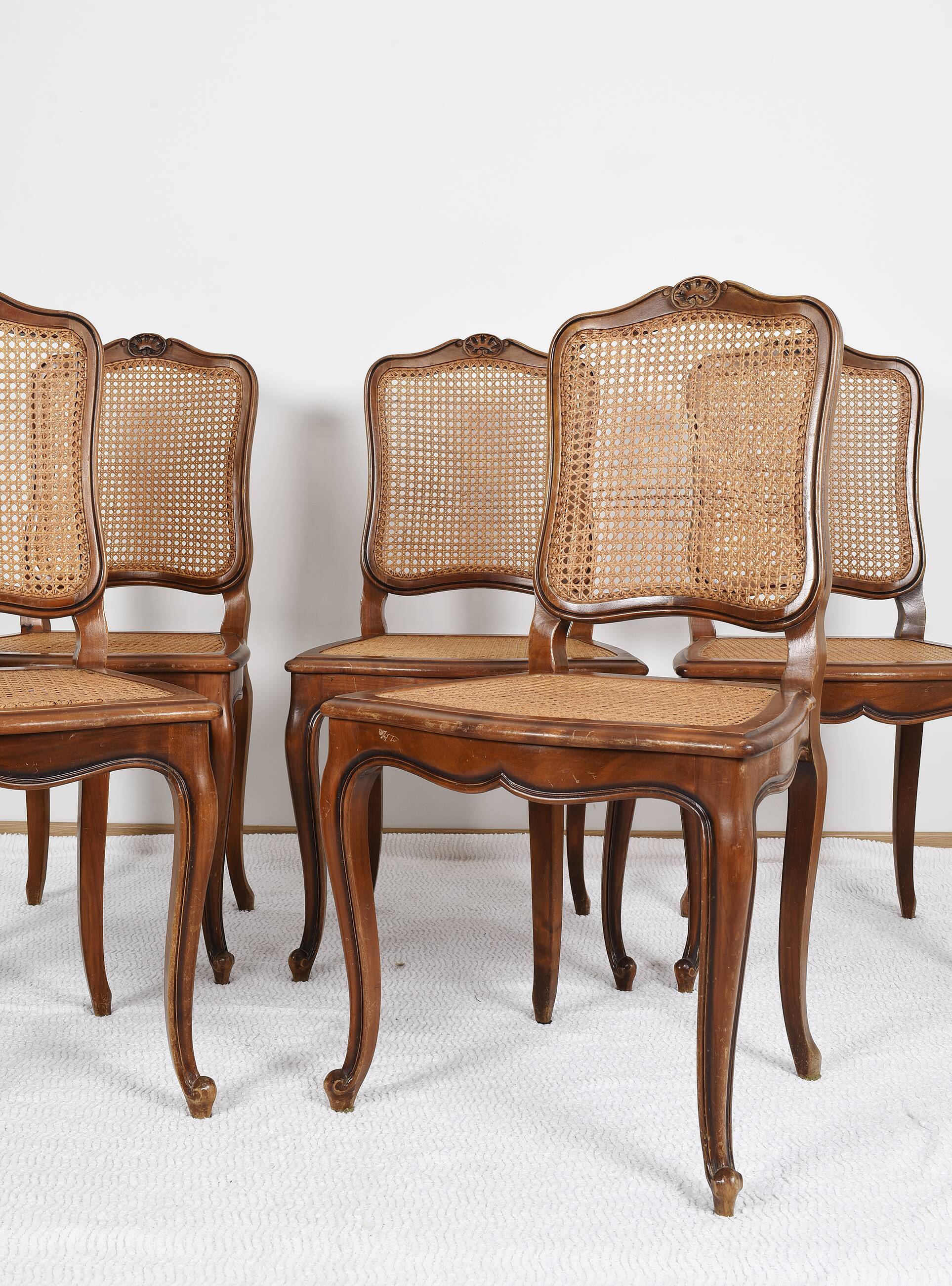 Series of 5 cane chairs, backs and seats, Louis XV style