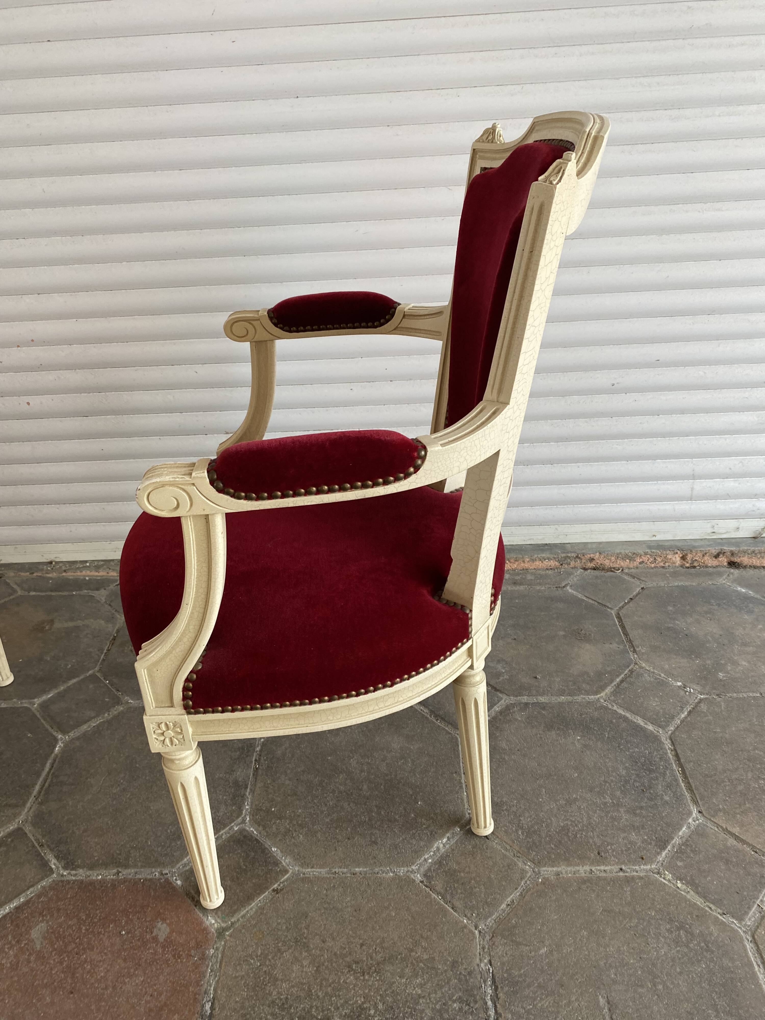 PAIR OF LOUIS XVI STYLE CABRIOLET ARMCHAIRS IN STUDDED RED VELVET FABRIC