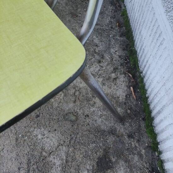 Pair of yellow formica chairs
