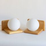 Duo of pine and opaline glass wall lights, 1980s