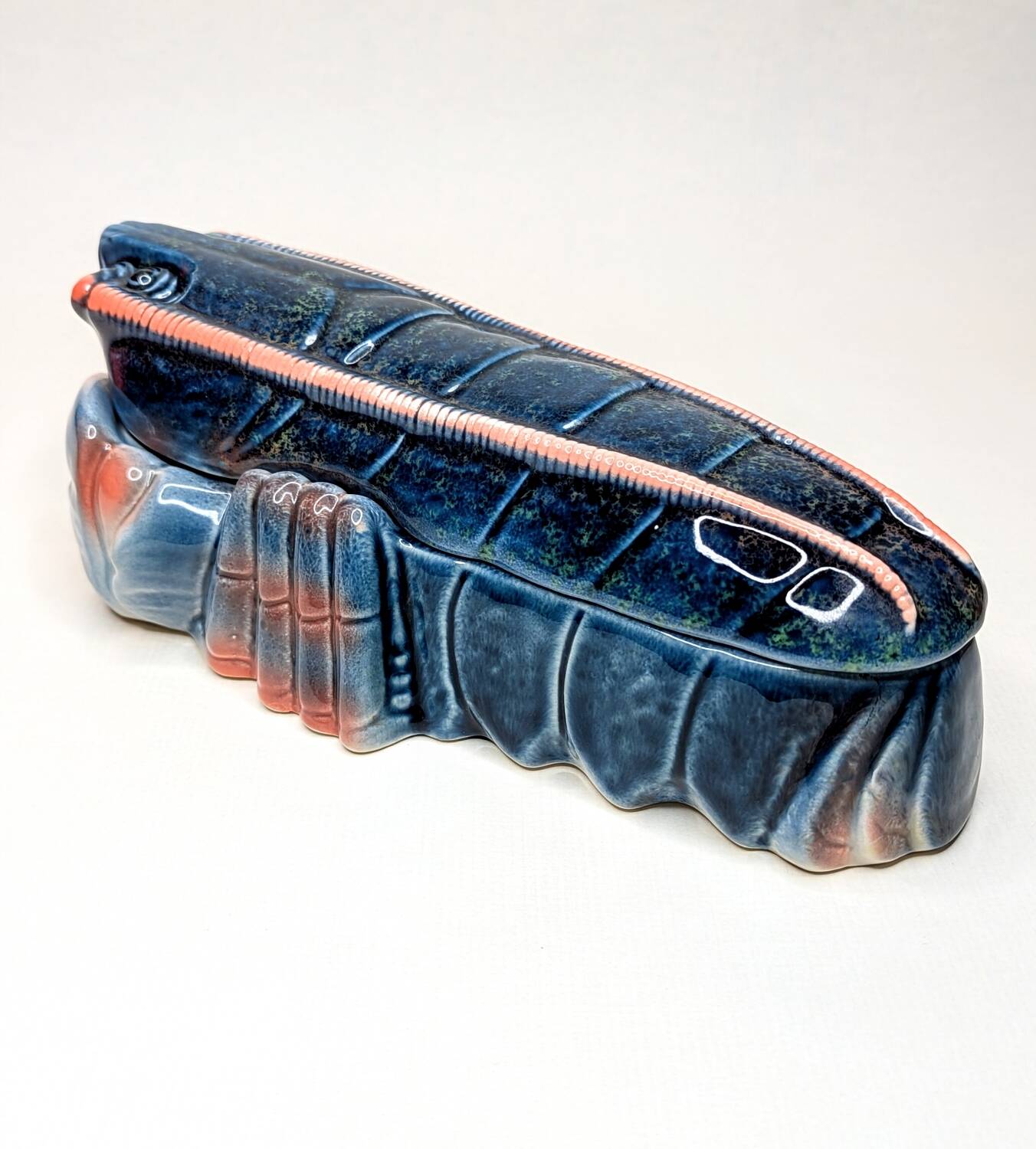 Lobster barbotine signed Michel Caugant midnight blue / coral