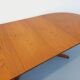Vintage oval dining table Baumann from the 60s and 70s in teak with extension.