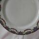 Set of 12 limoges porcelain dessert plates.
