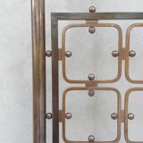 Double bed in burnished brass
