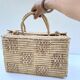 Valise vintage en fibres naturelles