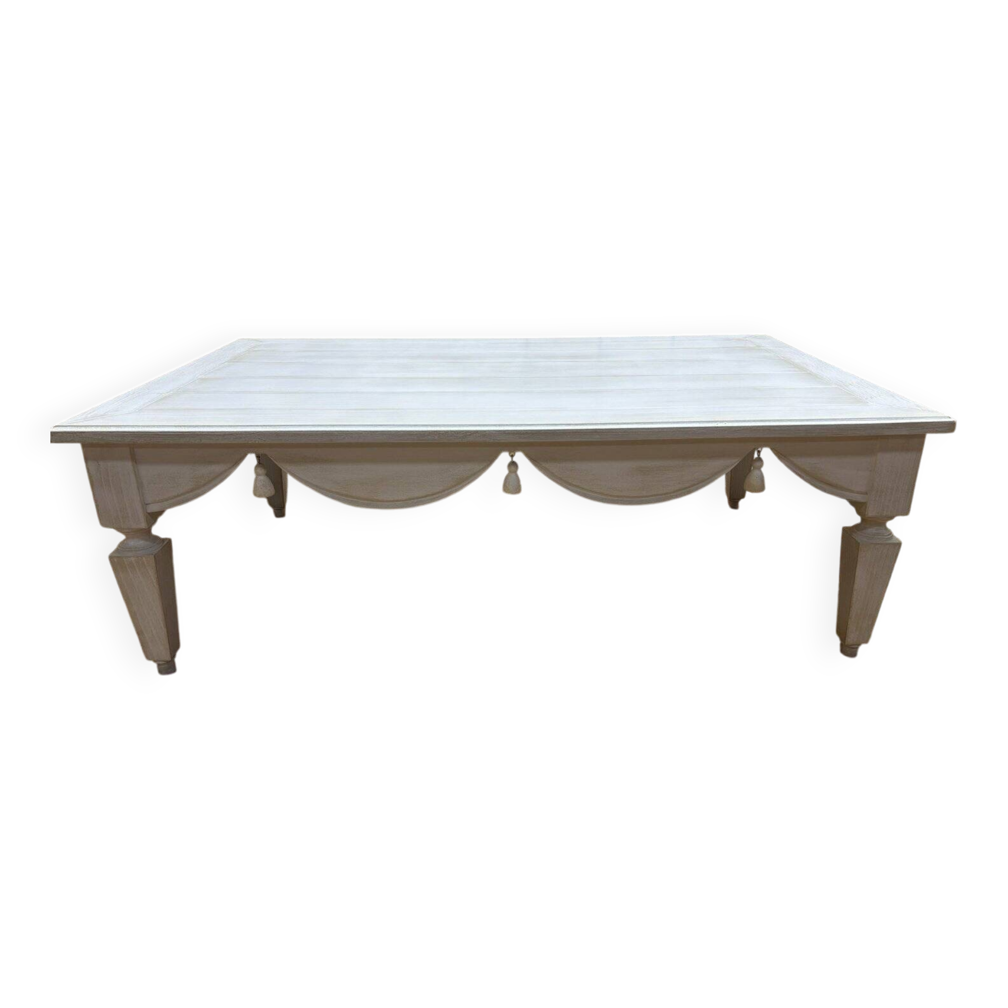 Painted wood coffee table with a distressed finish.