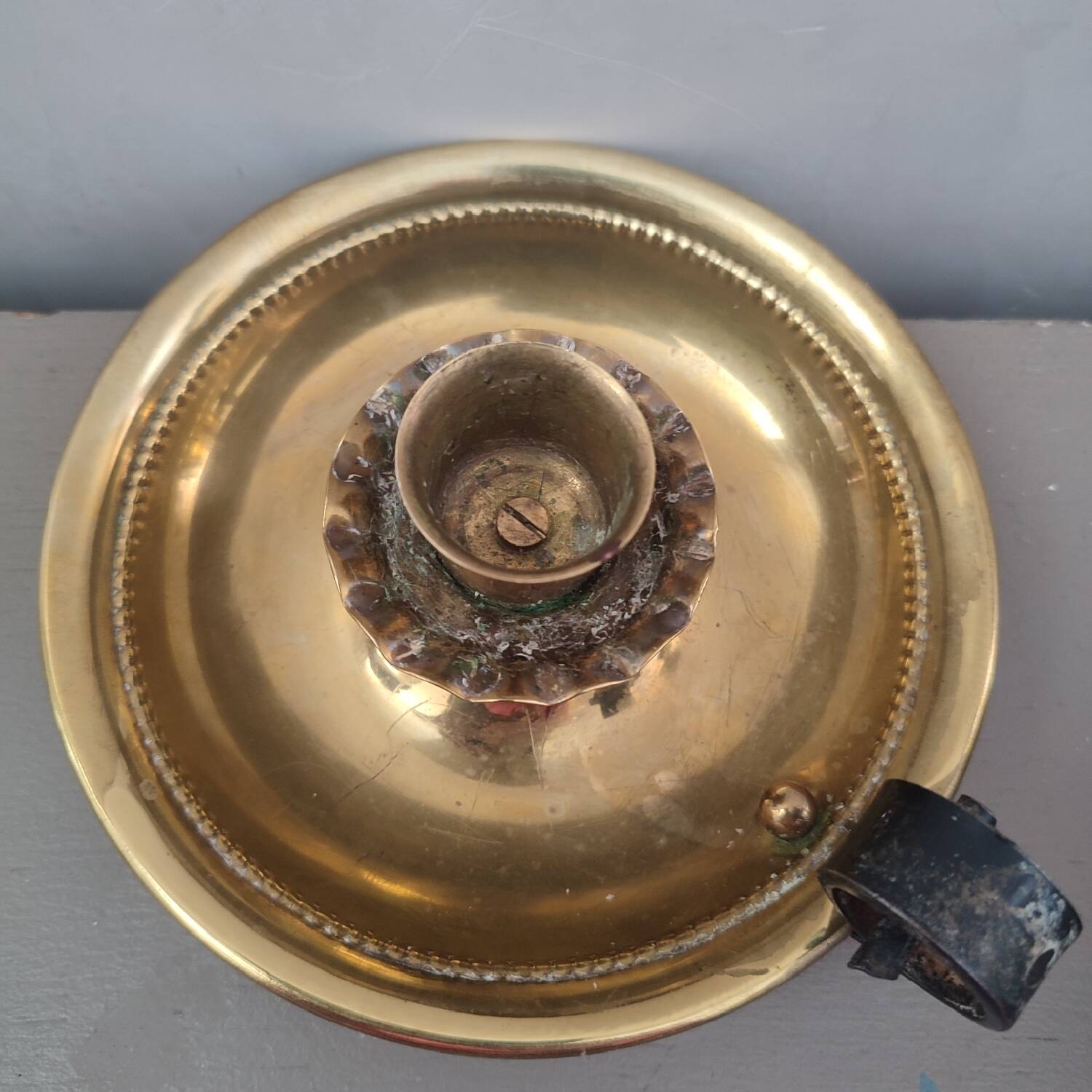 Brass cellar candle holder