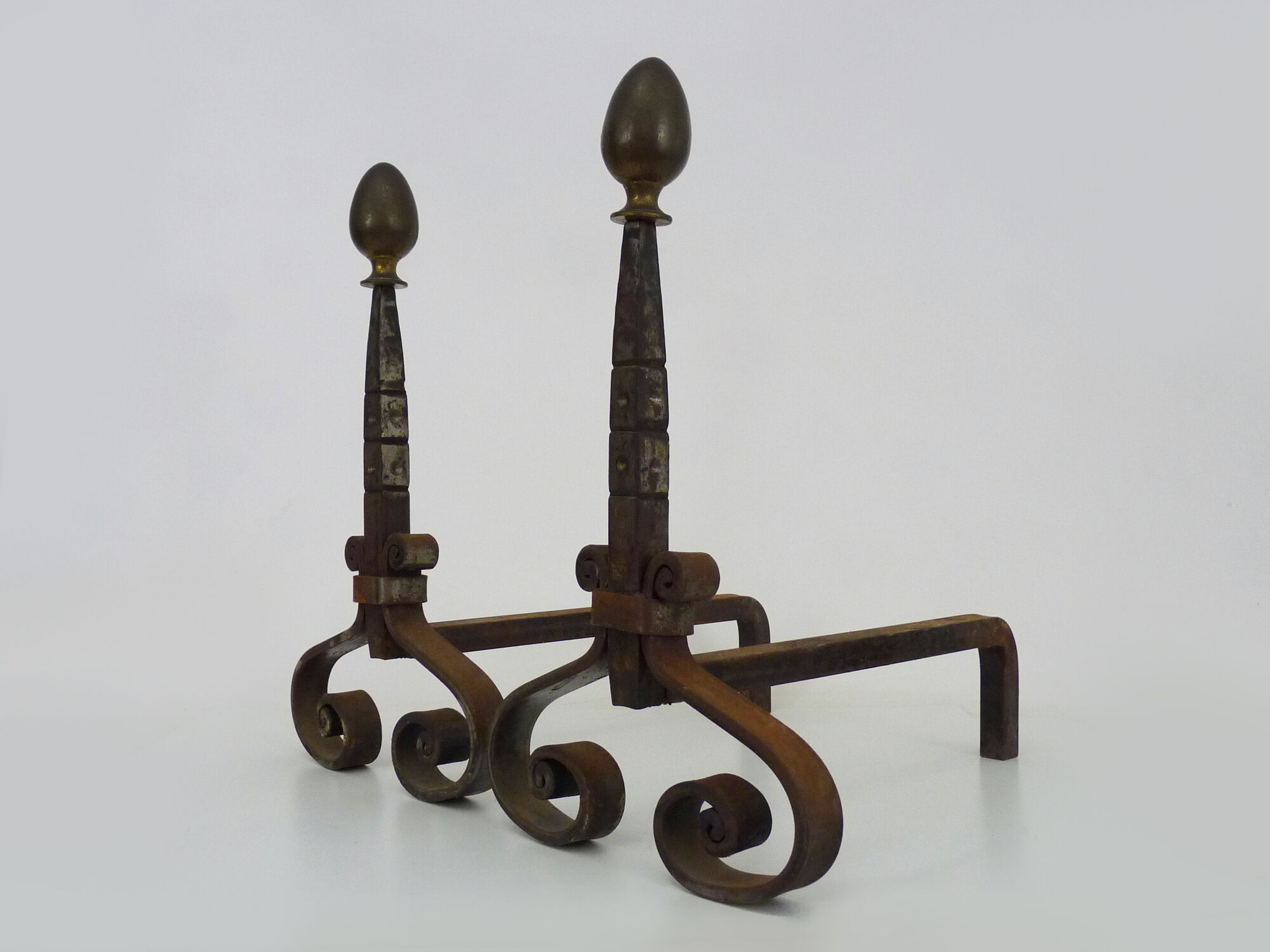 Pair of cast iron, wrought iron and brass chimney chenets. france 19th century