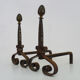Pair of cast iron, wrought iron and brass chimney chenets. france 19th century