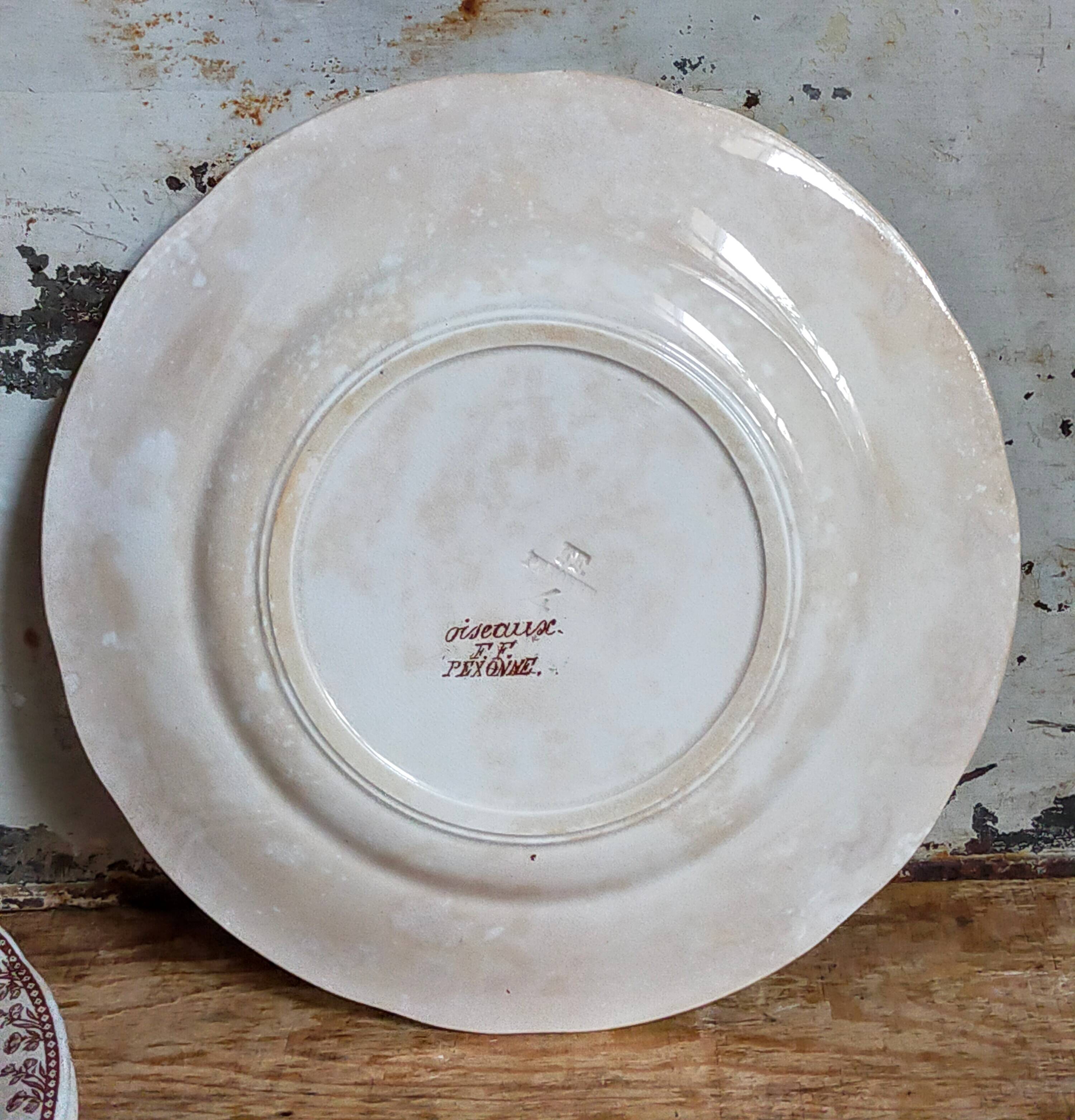 Seven iron earth dessert plates with birds ffPexonne late 19th century