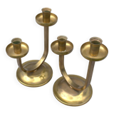 A beautiful pair of antique French Art Deco brass candlesticks