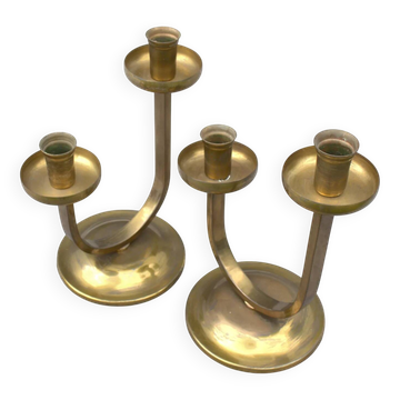 A beautiful pair of antique French Art Deco brass candlesticks