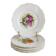 Antique plates from the late 19th century with scalloped edges and fruit decoration.