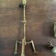 Rare articulated tripod base table lamp in gold-plated brass