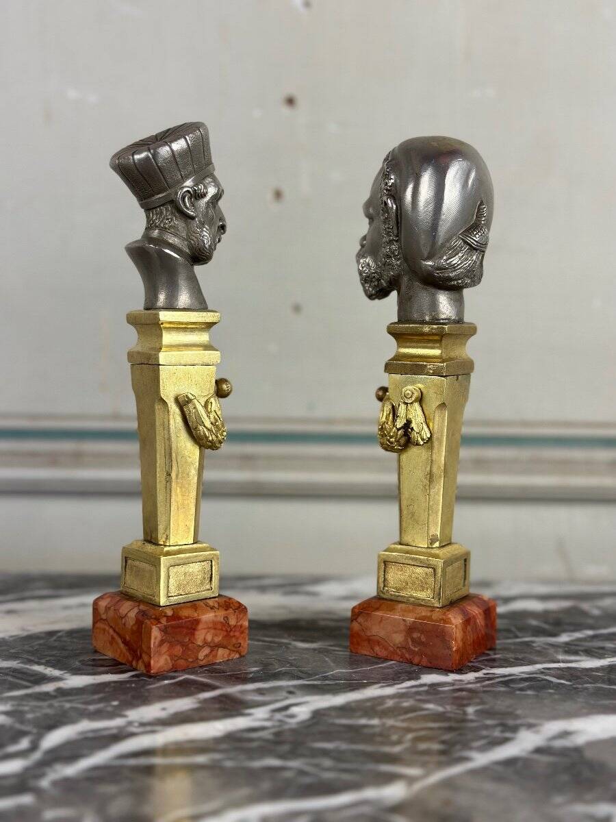 Pair of Abyssinian busts in nickel on gilded bronze and marble bases, 19th century.