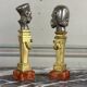 Pair of Abyssinian busts in nickel on gilded bronze and marble bases, 19th century.