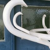 White parrot coat rack