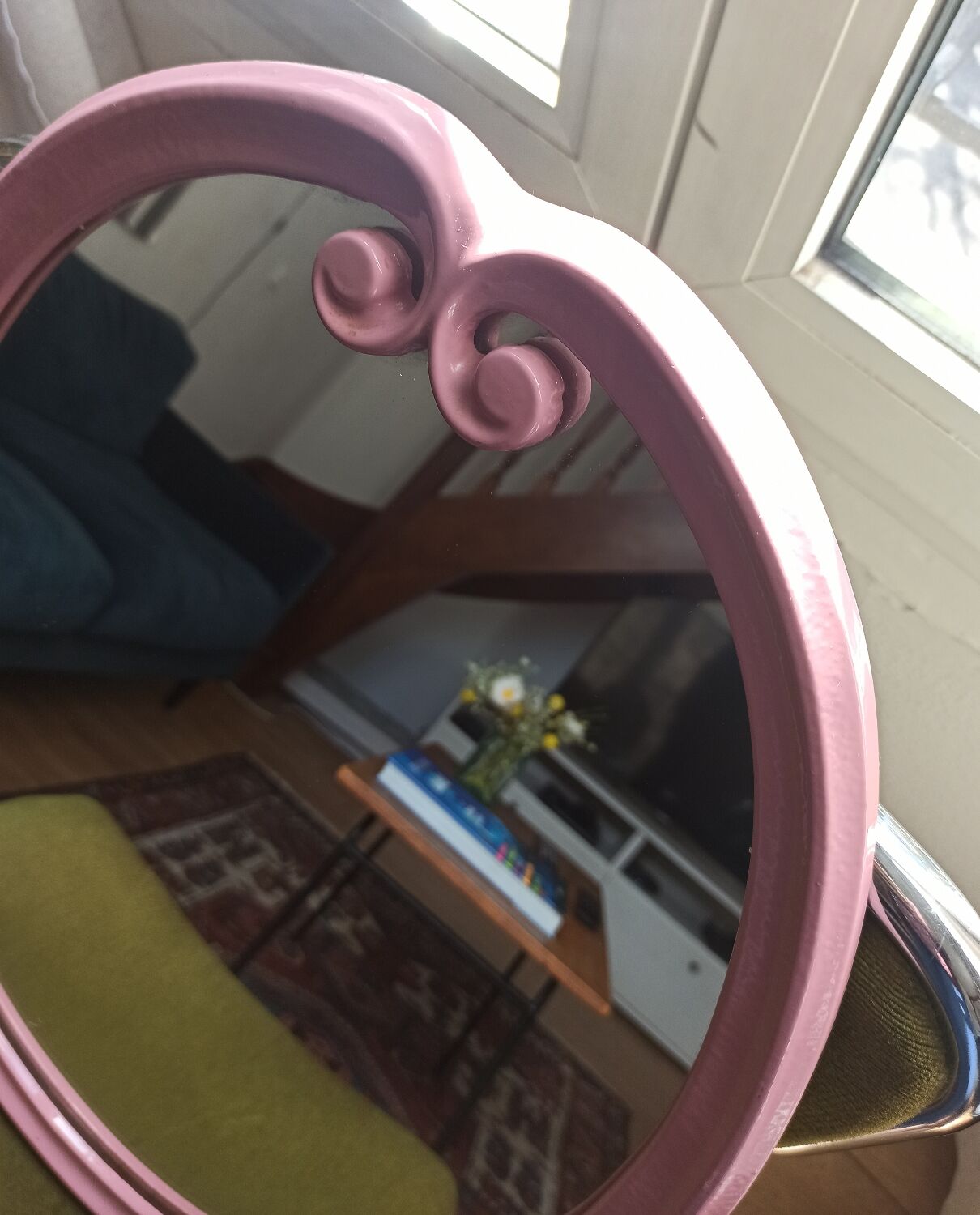 Vintage pink oval cast iron mirror