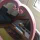 Vintage pink oval cast iron mirror