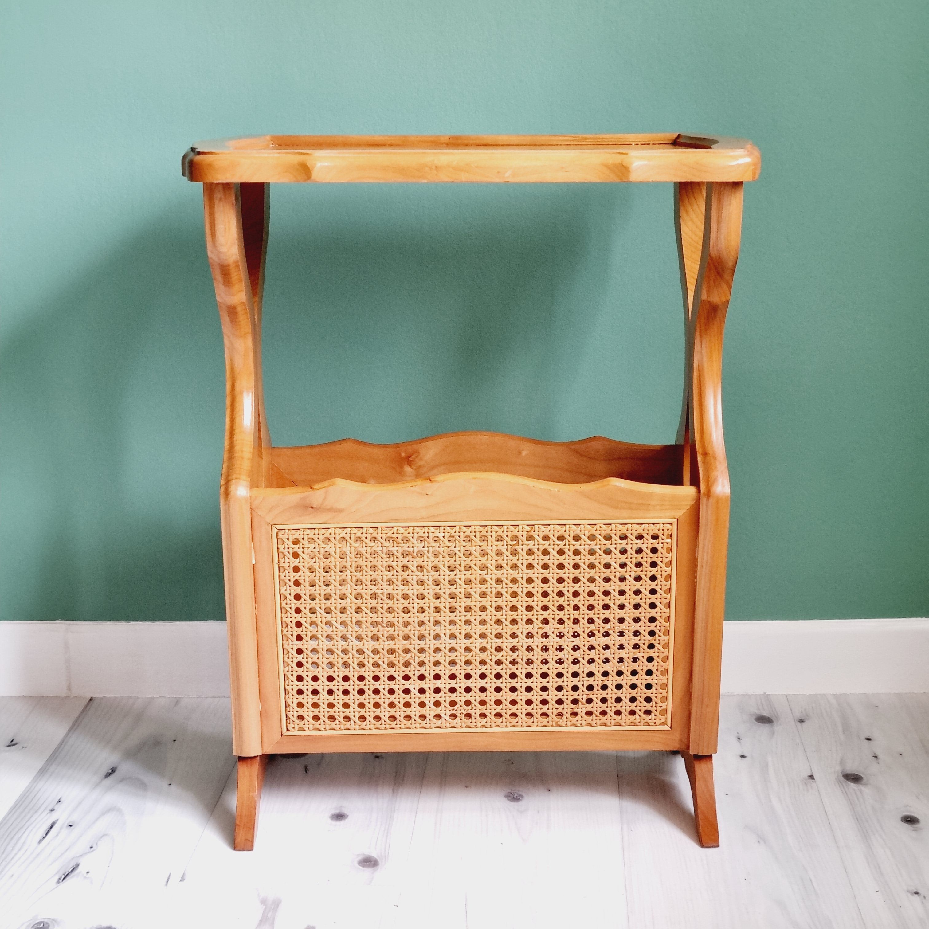 Side table with wooden and cane magazine holder