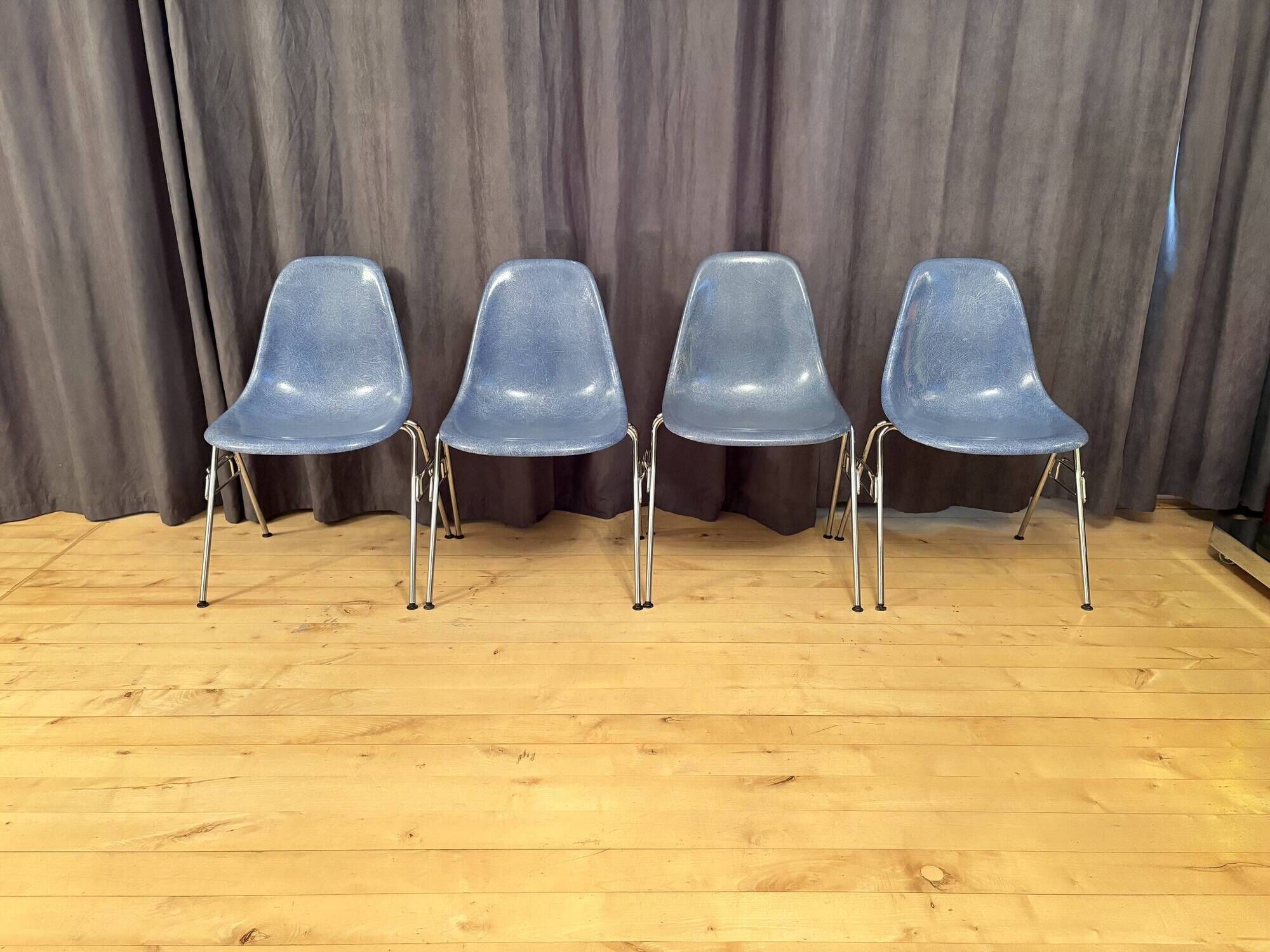 Set of four DSS chairs, fiberglass, designed by Charles and Ray Eames, Herm