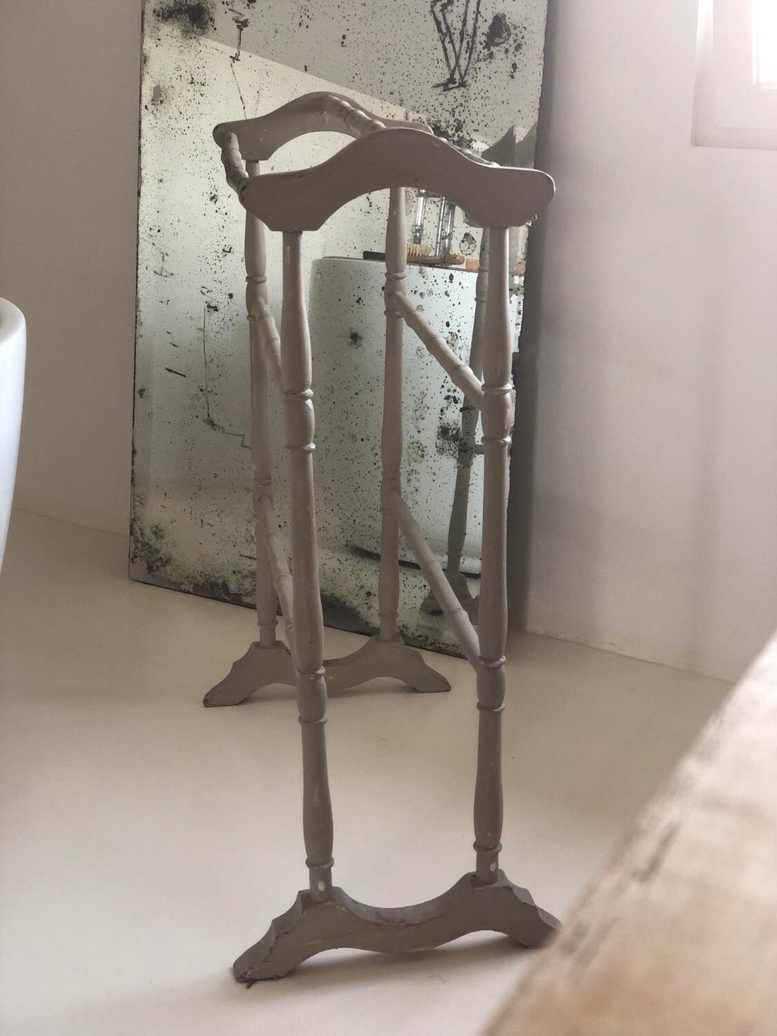 Old bathroom towel rack in patinated wood