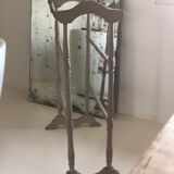 Old bathroom towel rack in patinated wood