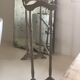 Old bathroom towel rack in patinated wood