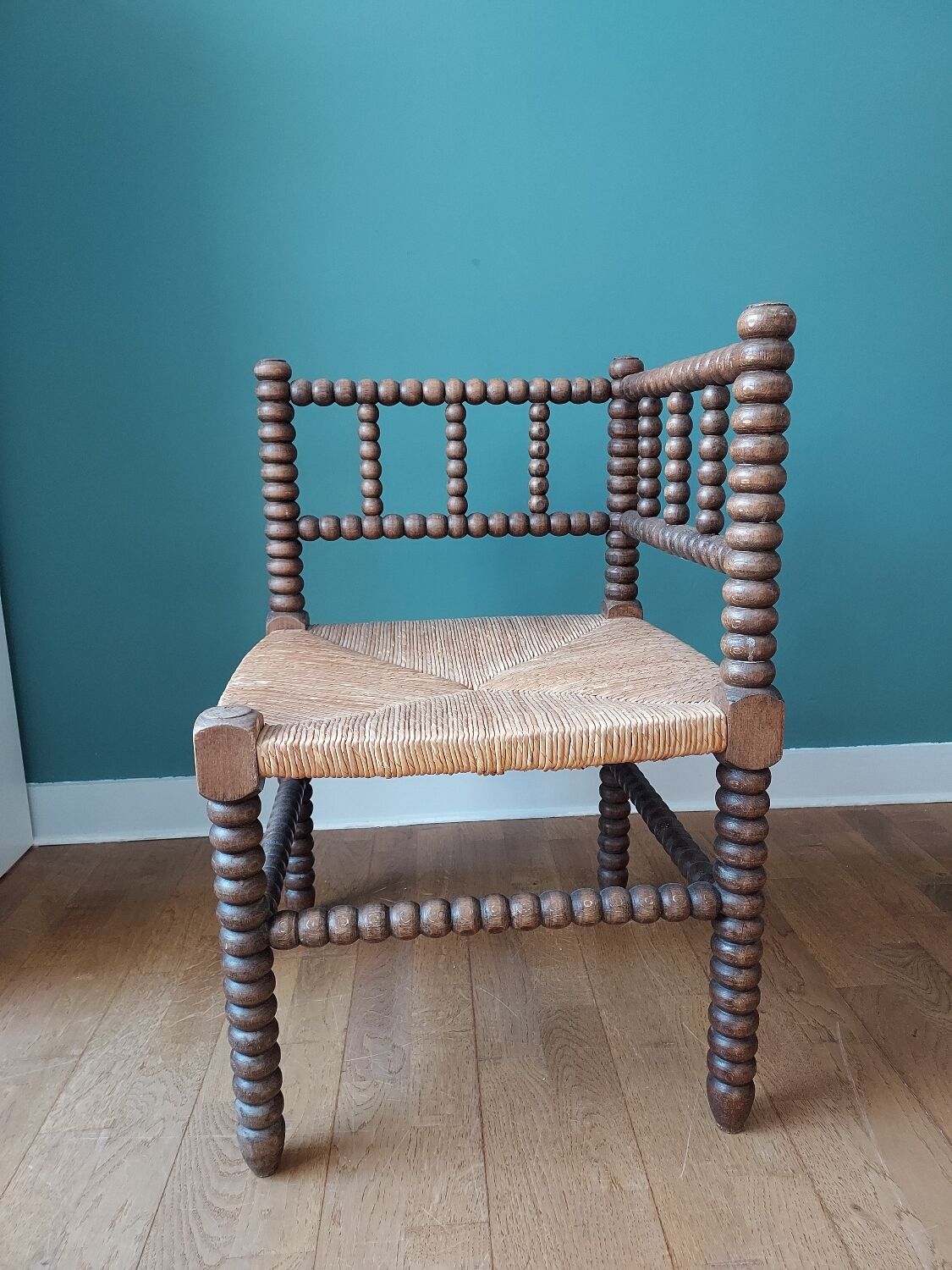 Corner armchair in turned wood