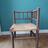 Corner armchair in turned wood