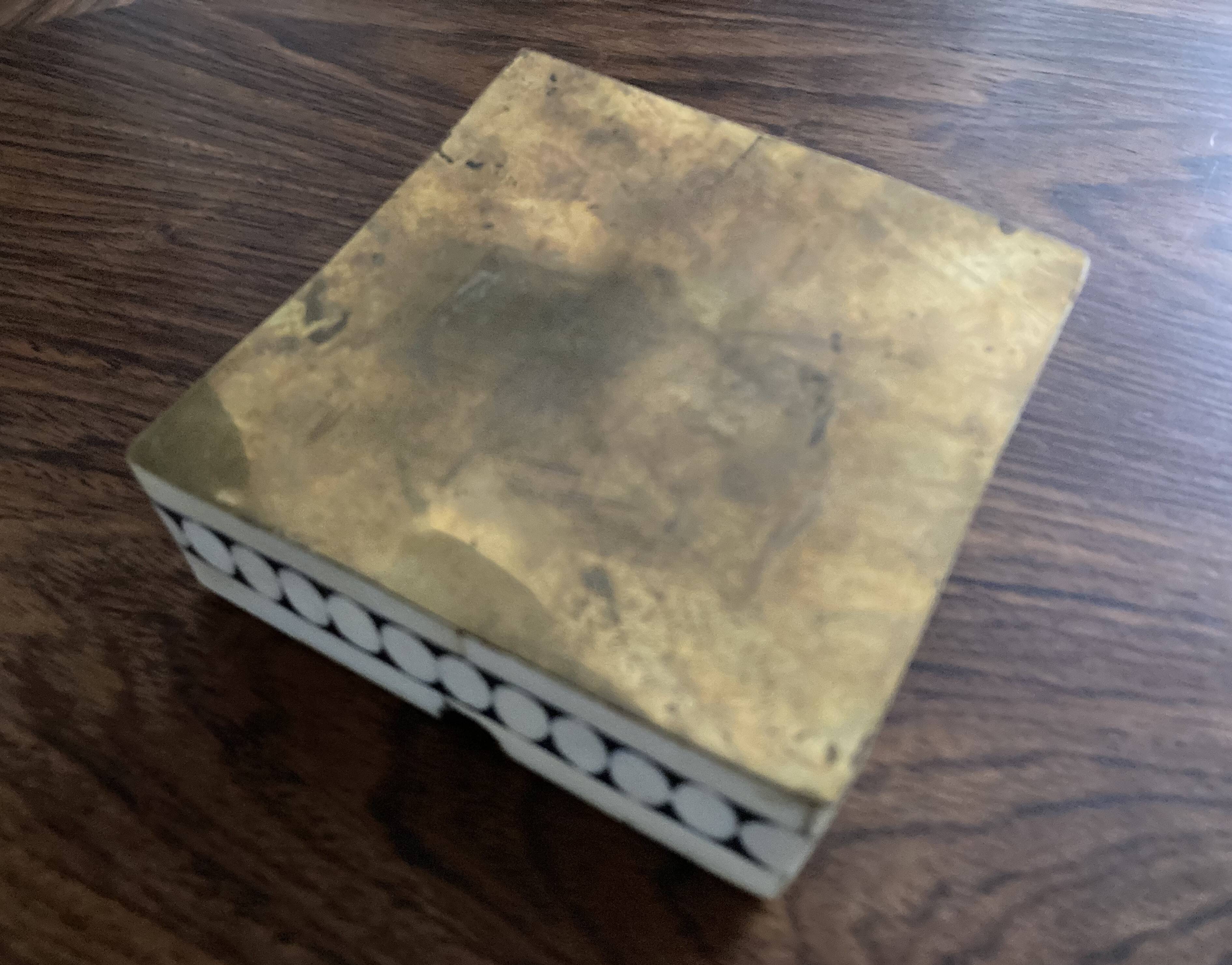 Bone and brass ashtray