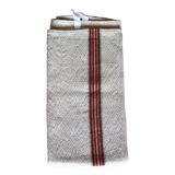Old chevron towel with red and green stripes.