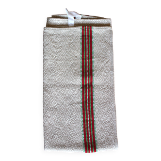 Old chevron towel with red and green stripes.