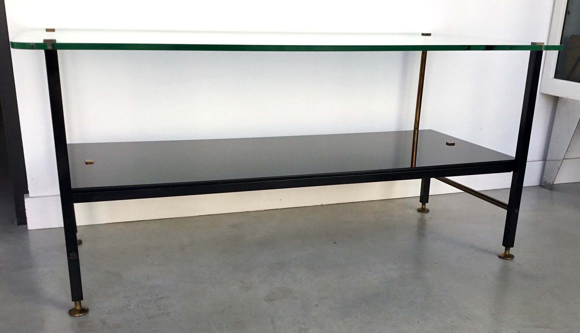 Modernist coffee table in metal tubular base and glass top 1950