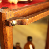 Serving in varnished chestnut and red leather