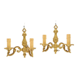 Pair of sconces in gilded bronze double candles