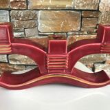 Former pair of burgundy ceramic candlesticks