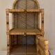 Vintage Spanish rattan and wicker bookshelves with lower door, 1970s.