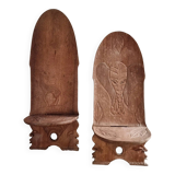 Pair of hand-carved wooden folding chairs – African origin, animal and face motifs, mid-20th century