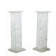 Pair of Art Deco style columns, in white marble, 20th century