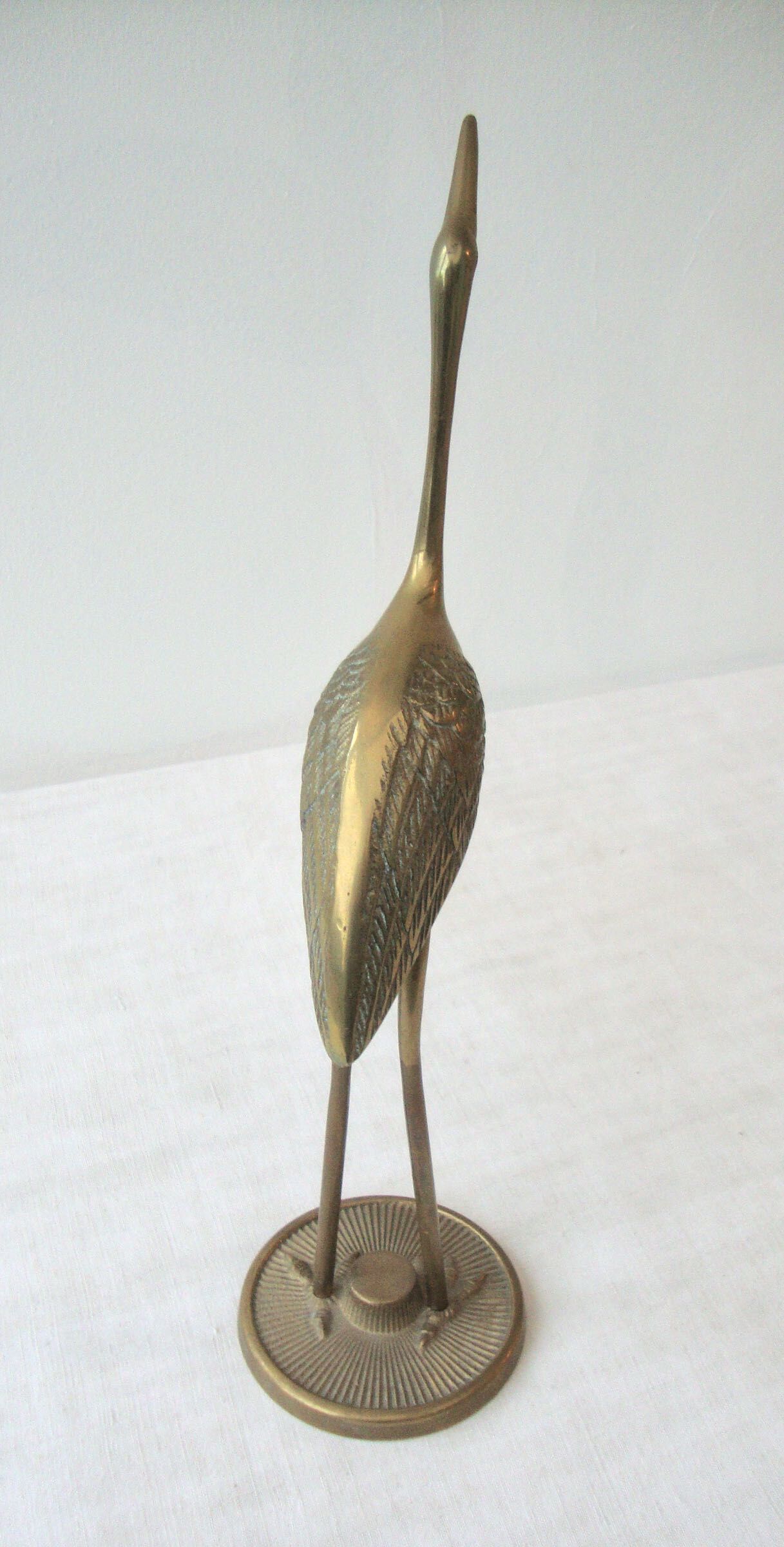 Brass heron