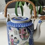 Japanese-inspired porcelain teapot.otifs Geishas kimonos, cherry blossoms