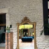 Antique mirror 169/105cm with pediments and pearl detailing in gold leaf.